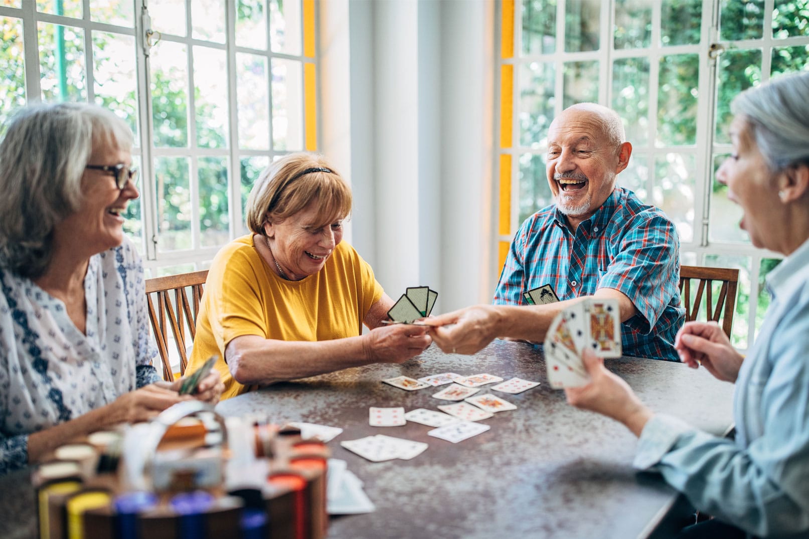 Seniors playing card game